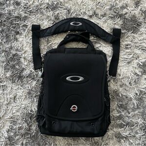Oakley Tactical Field Gear Vertical Messenger Day Pack Laptop Tablet Bag Black